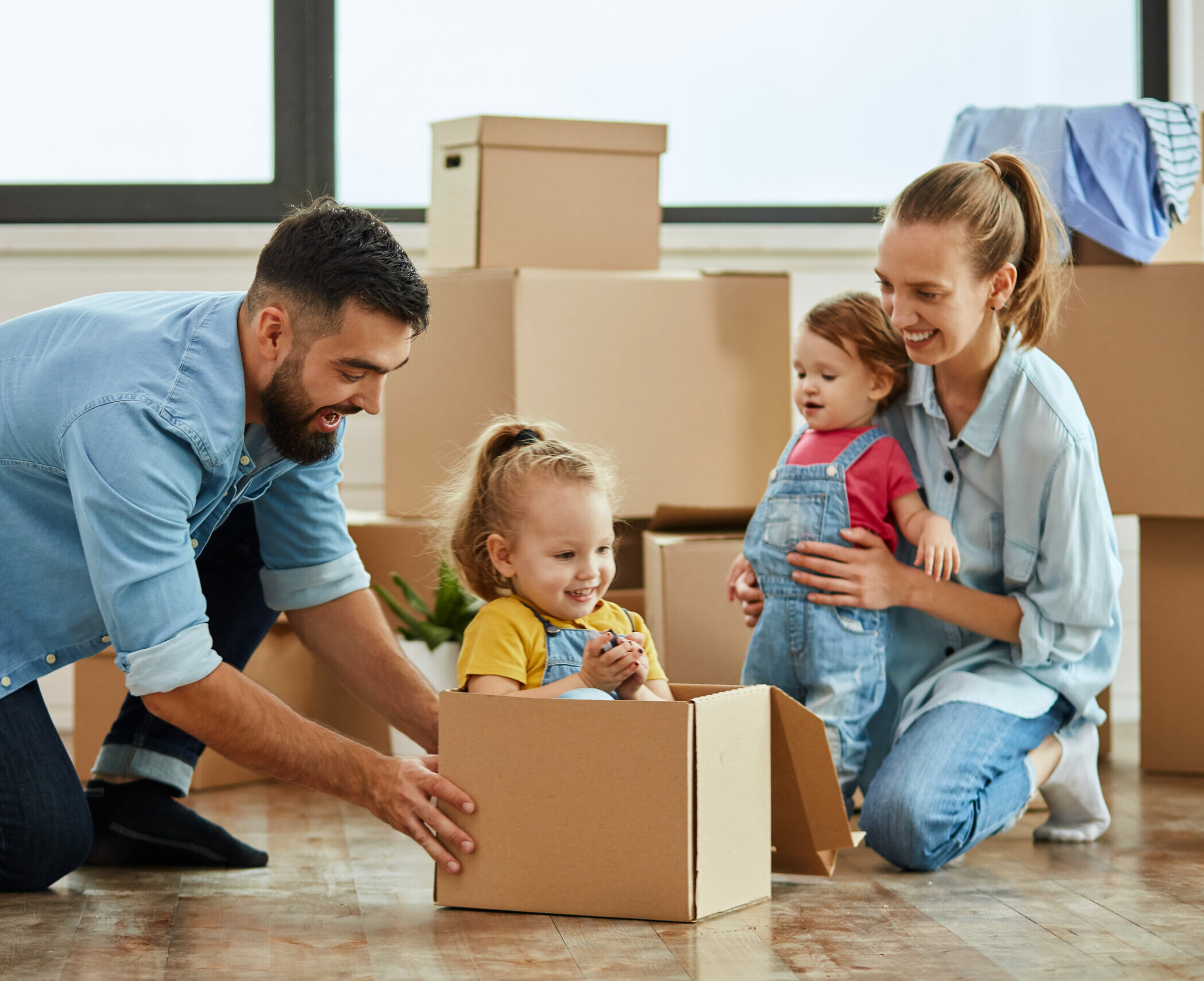 Caucasian family move in new house